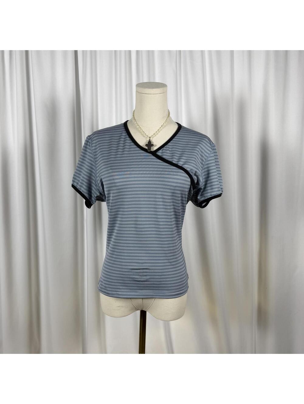 y2k style athletic nike striped top with retro cross design